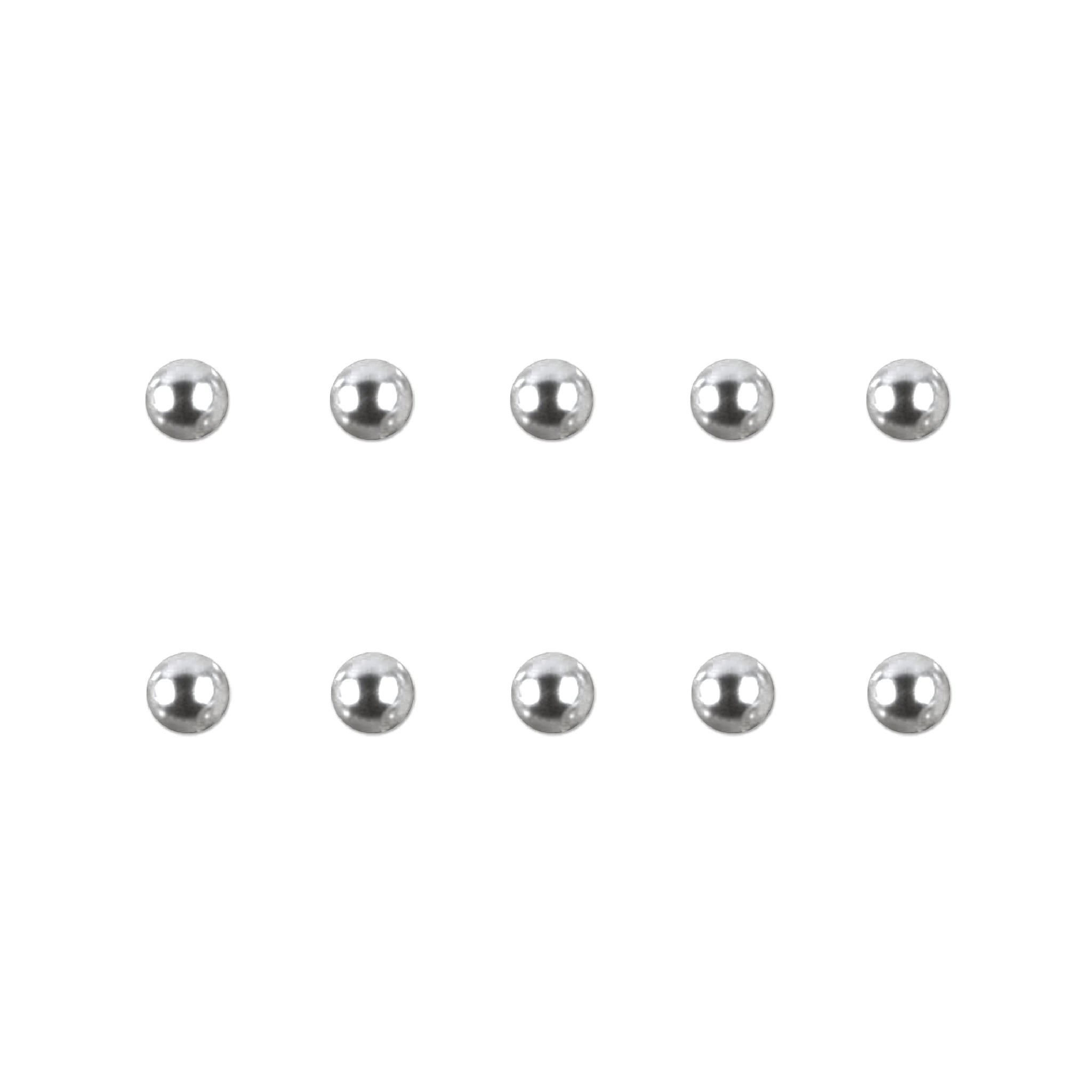 Set of silver chrome nail charms on a white background