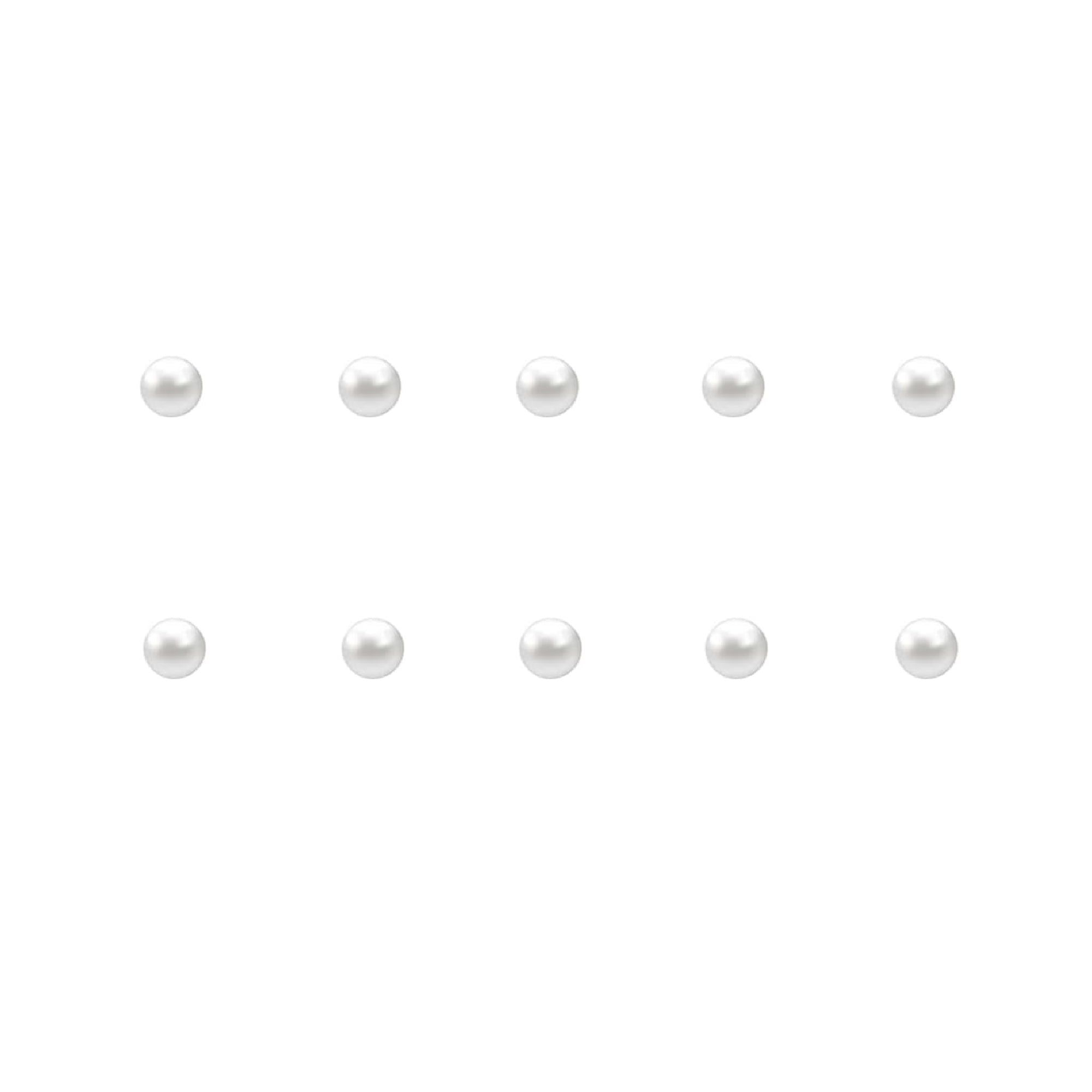 Set of small pearl nail charms on a white background